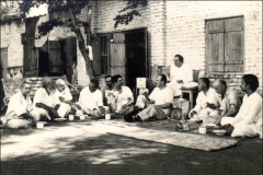 Baba and men in front of Meherazad rooms